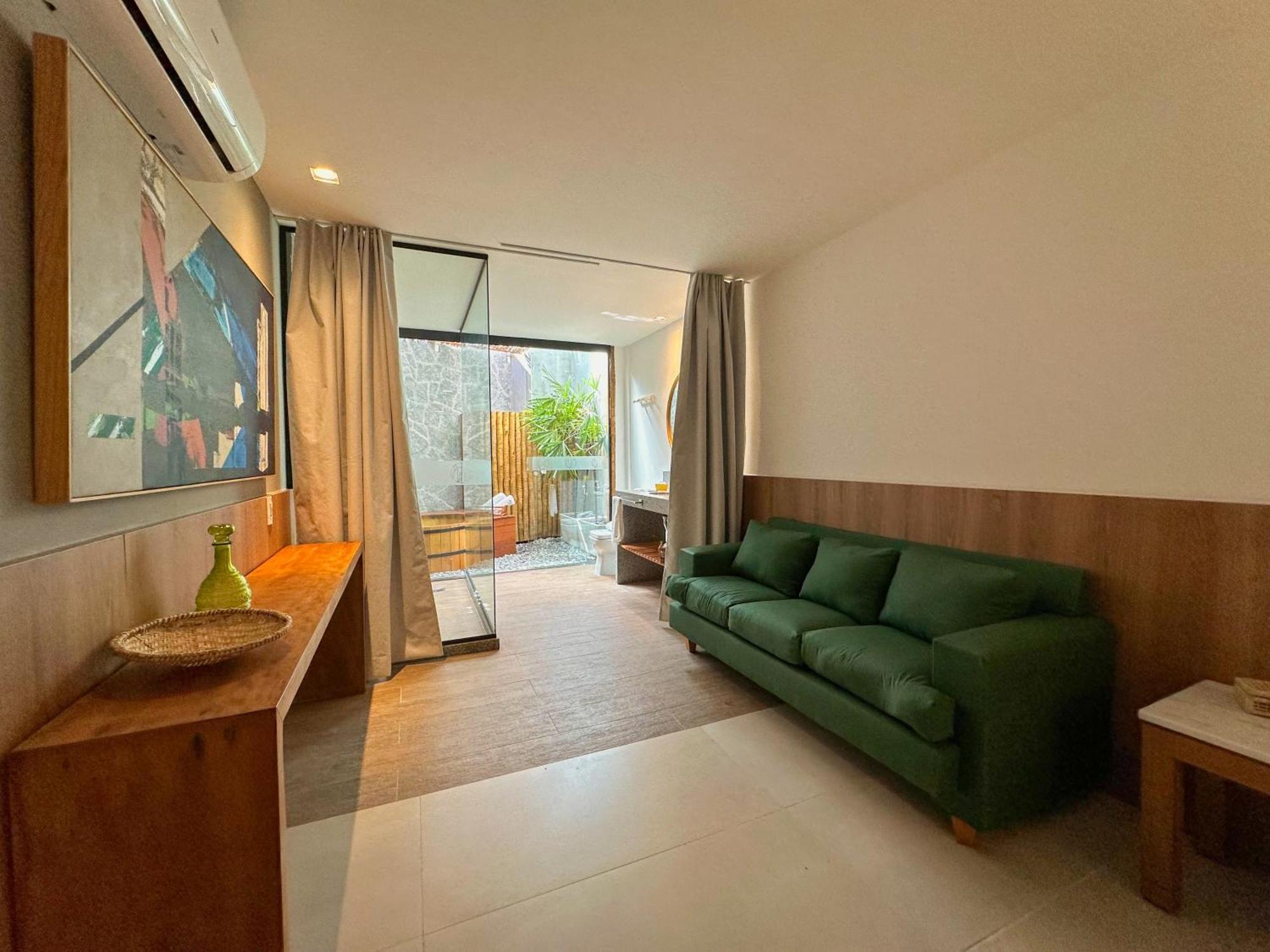 Passagem Concept Hotel E Spa Cabo Frío Exterior foto A living room in a micro apartment in Beijing, China